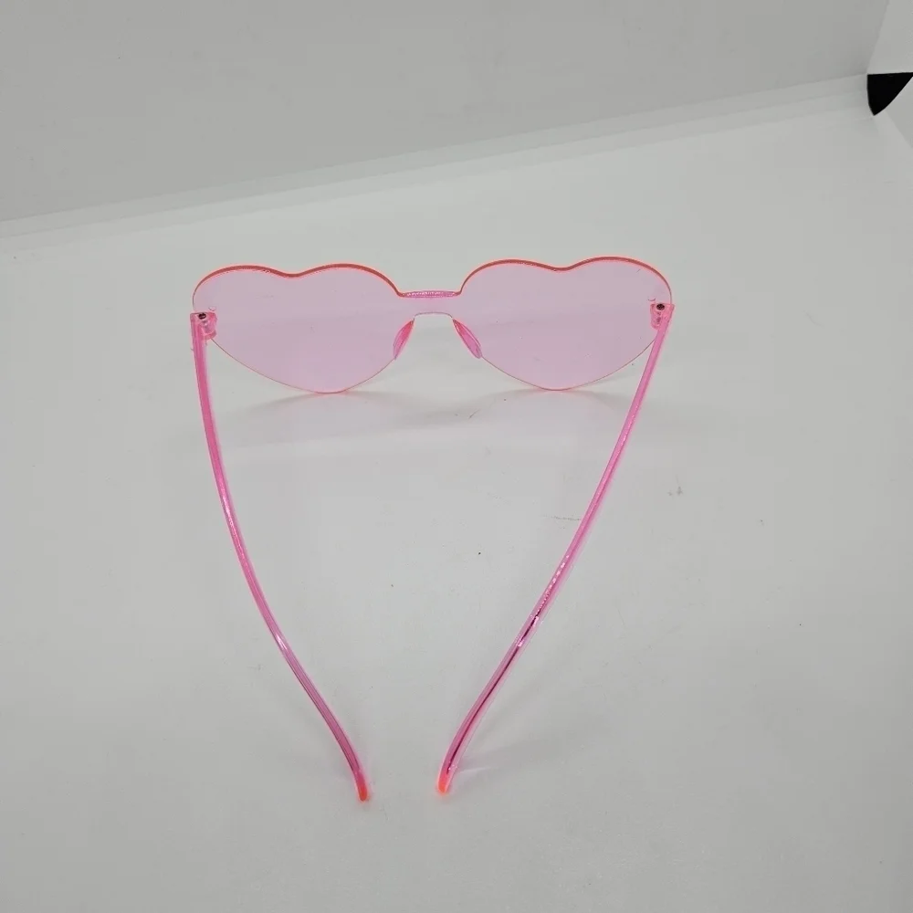 pink plastic heart shaped glasses